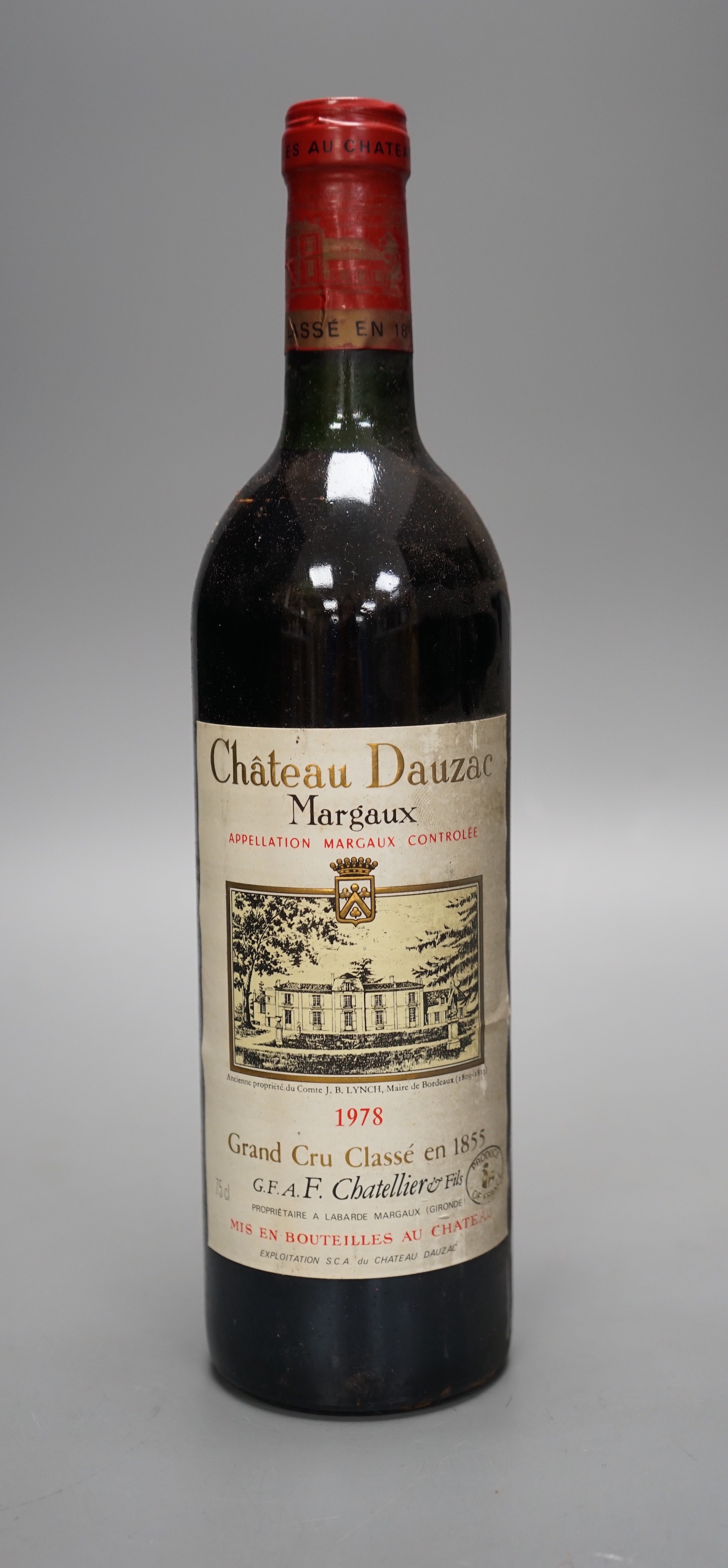 Six bottles of Chateau Dauzac Margaux 1978, four bottles of Chassange-Montrachet 1982 and two other bottles of wine